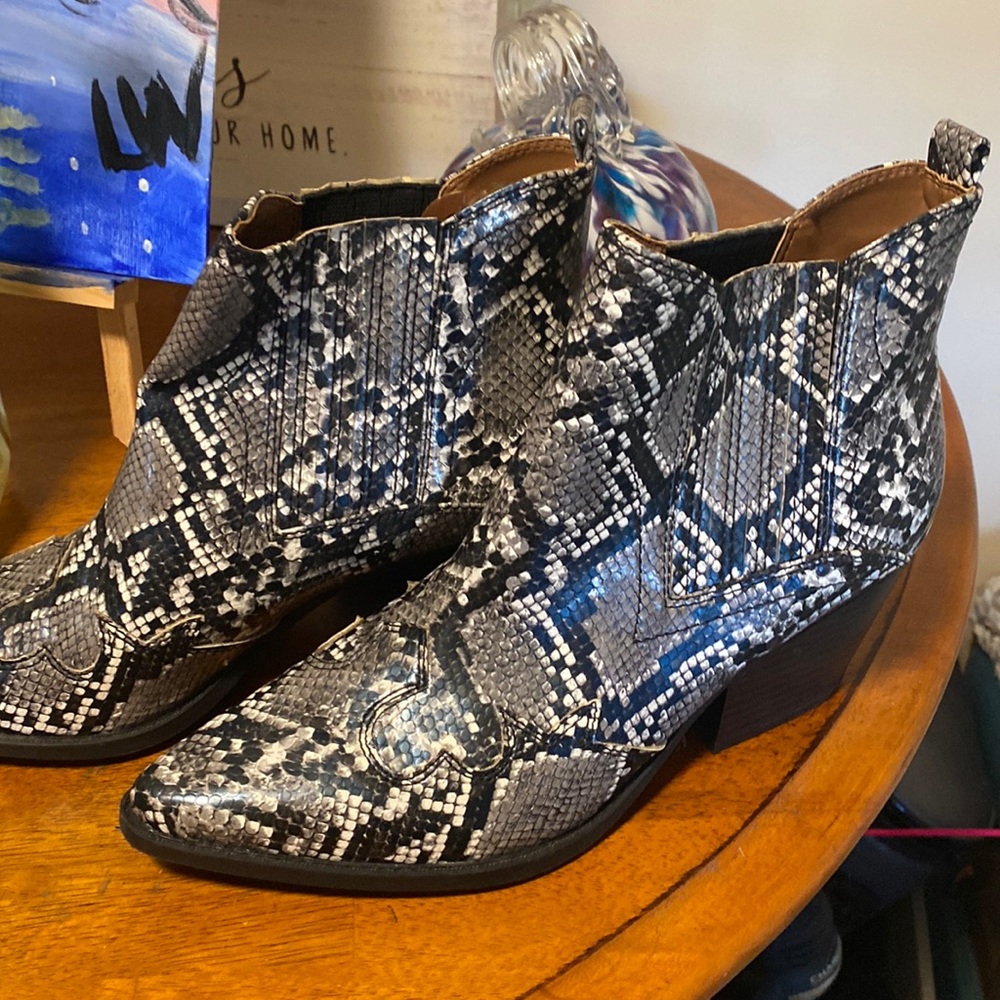 Snake skin heeled boots